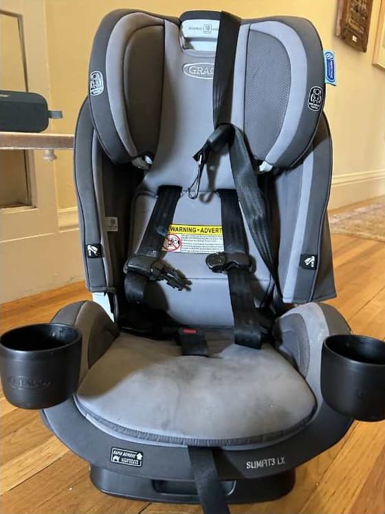 Before: Car seat, deep cleaned
